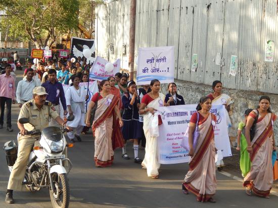 Women marching for a violence free India.